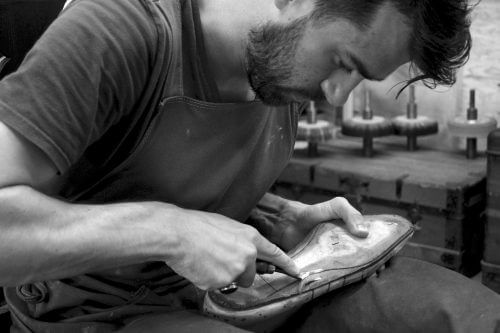 Man working on the sole of a shoe