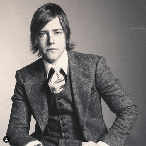 Paul Banks modeling Robinson's Harris tweed suit