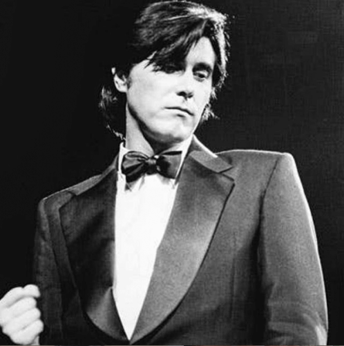 Old photo of a man wearing a tuxedo