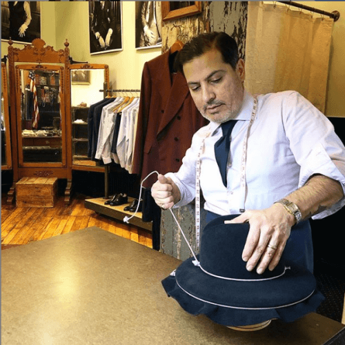 Robinson working on making a hat