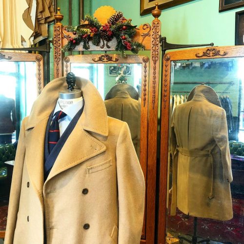 Display of a beige overcoat