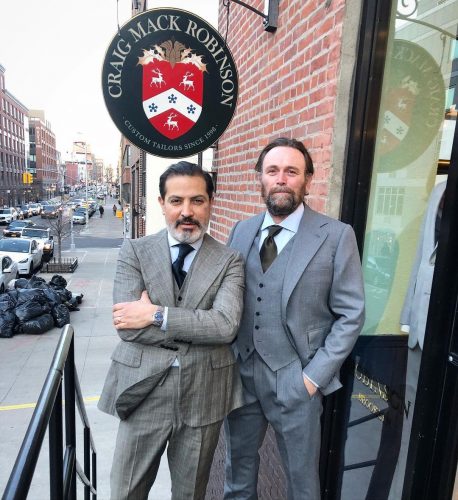 Robinson men outside of store